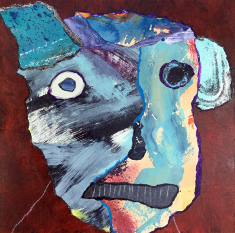 Mixed media outsider art collage of an abstract dog face with one ear up and one ear down.